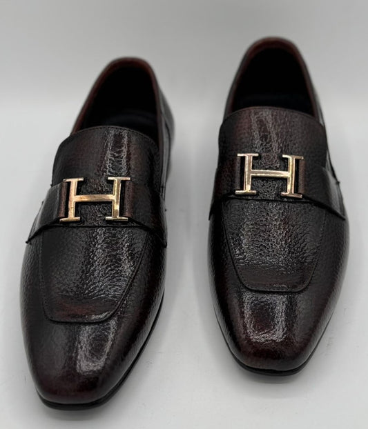 dark brown or burgundy pebble-grain leather H buckle