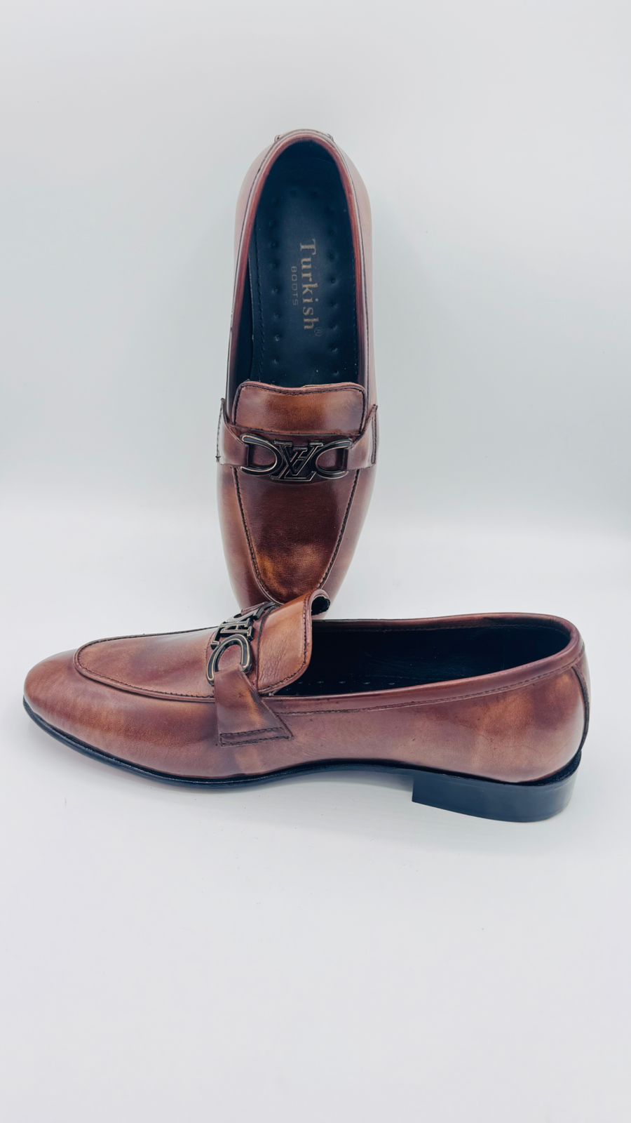 brown leather loafers