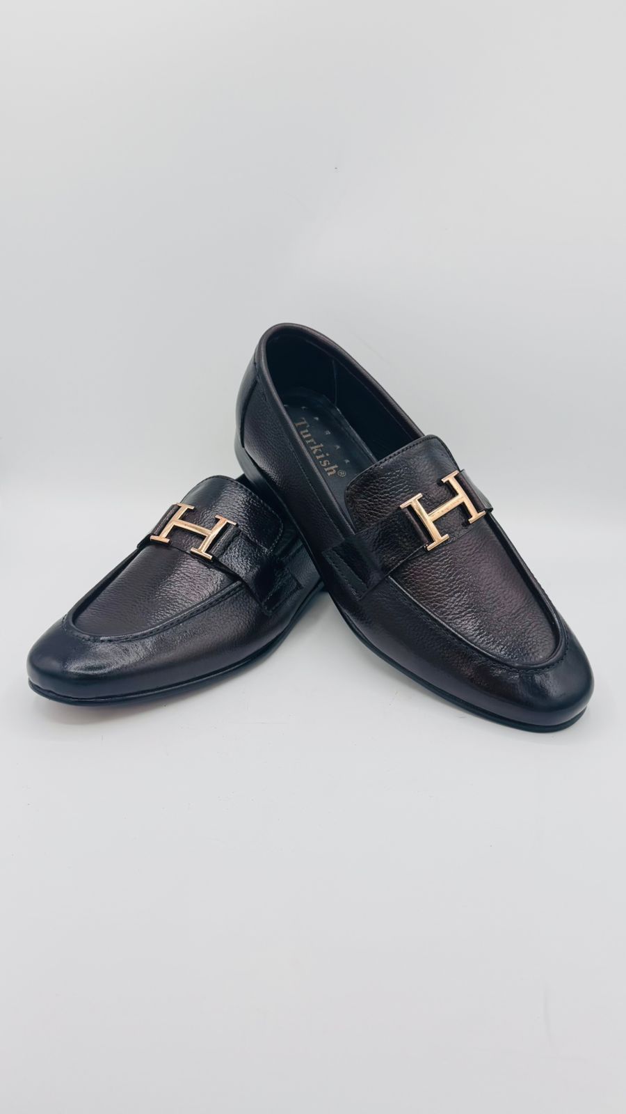 Luxury Black Leather Loafers with Signature “H” Buckle