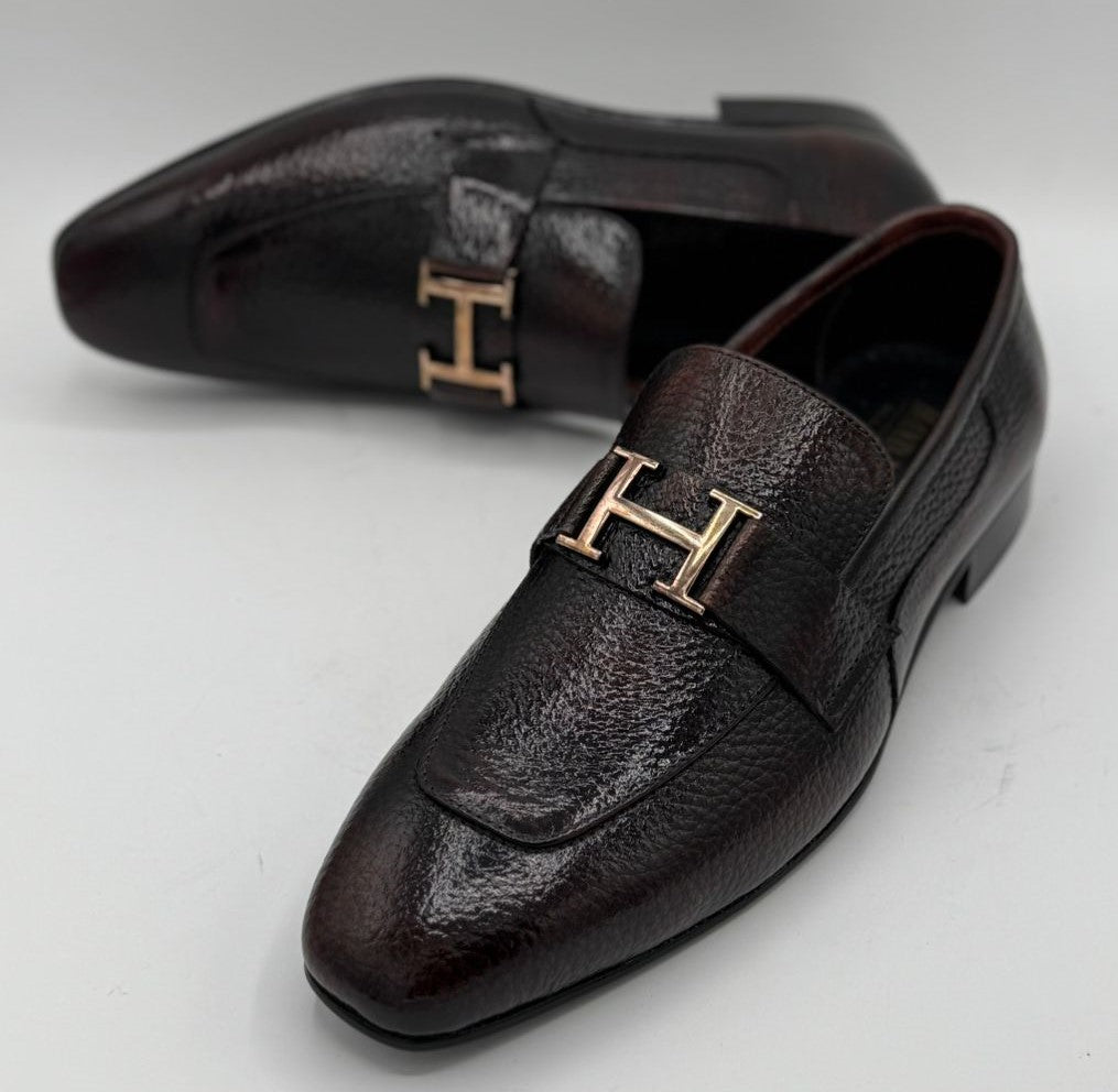 dark brown or burgundy pebble-grain leather H buckle