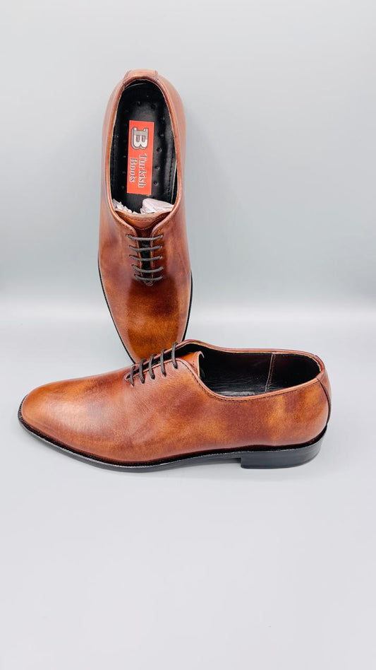 brown leather Oxford shoes